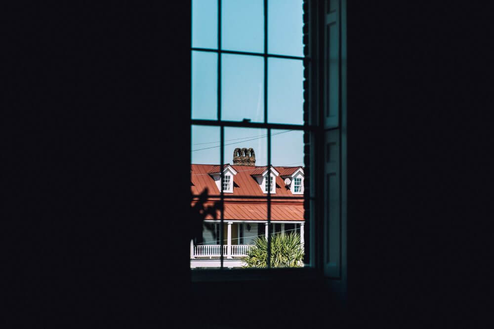 Charleston's architecture is best viewed through the sunny weather of summer. (Photo by Emma Frances Logan on Unsplash)